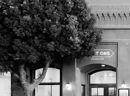 Exterior view of ROOT ONE – Guadalupe, a trusted Santa Maria dispensary, featuring a modern storefront with clear signage and a welcoming entrance for customers.